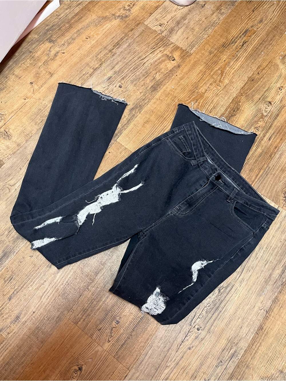 SHEIN Black Ripped Flare Jeans with Raw Hem